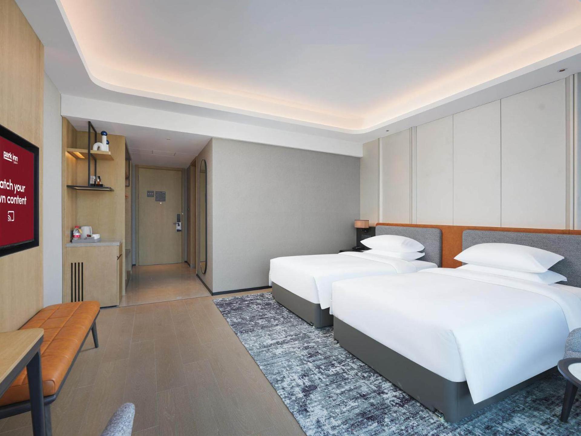 Park Inn By Radisson Nanchong Yilong Star City Plaza Exteriör bild