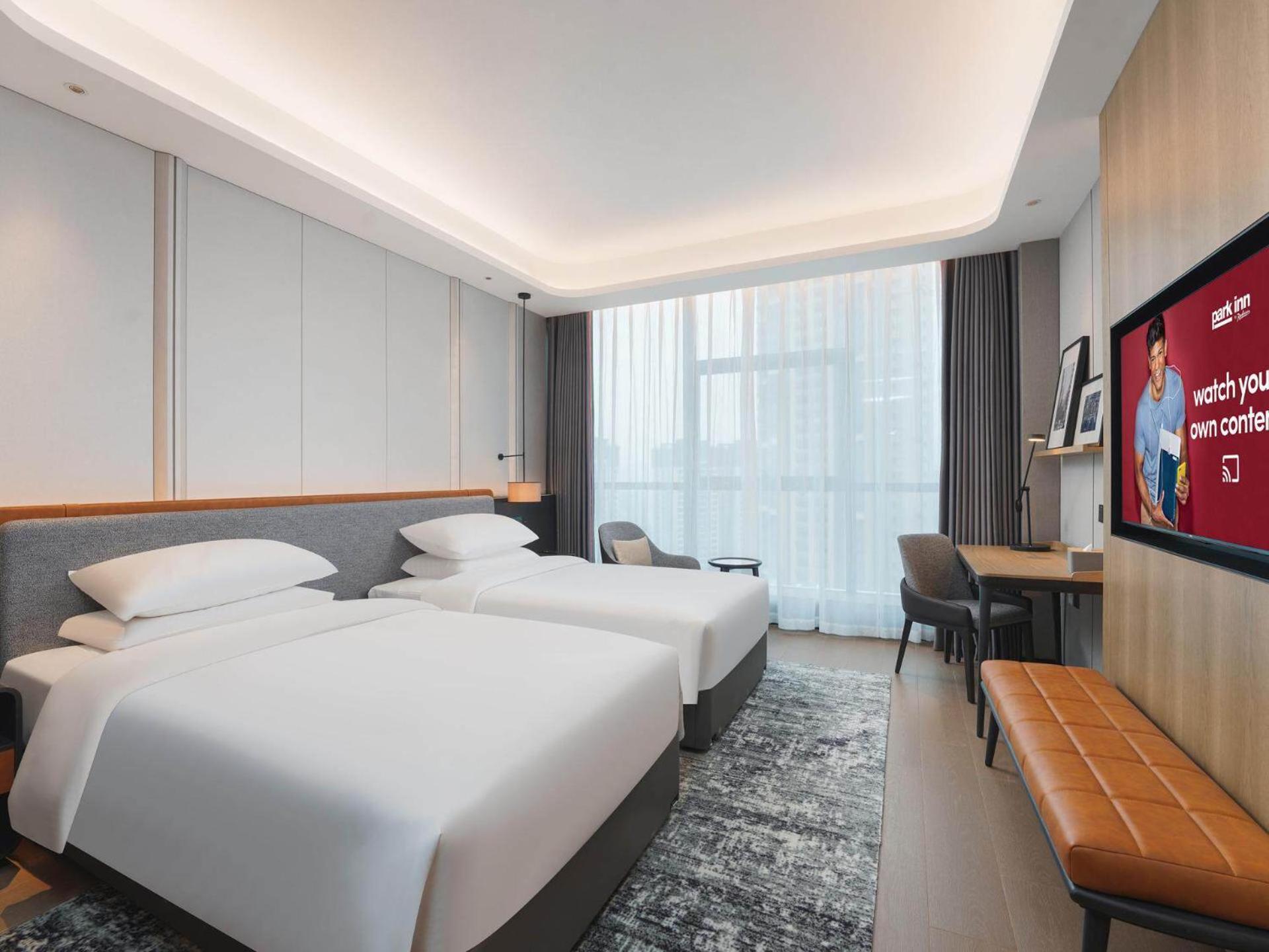 Park Inn By Radisson Nanchong Yilong Star City Plaza Exteriör bild